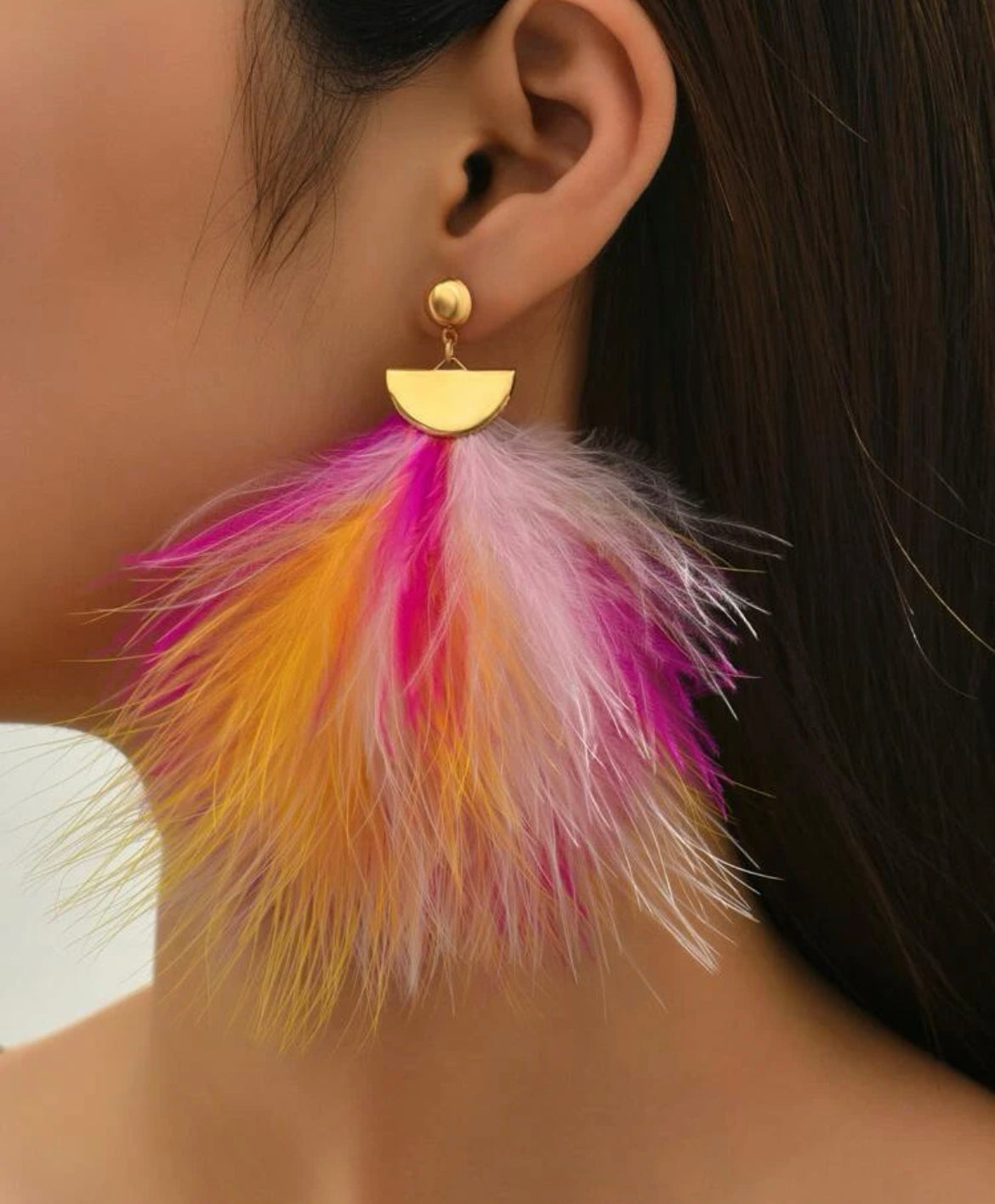 pink earrings, pink feather earrings, pink and yellow feather earrings. 